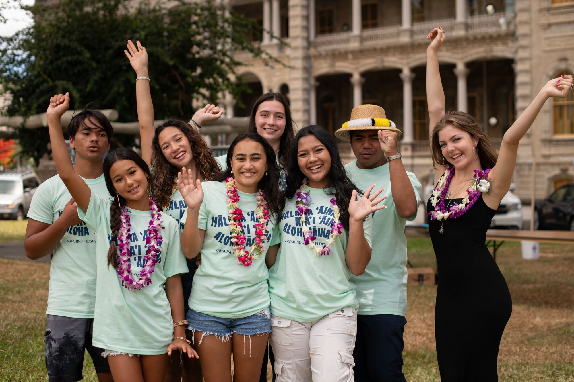 climate-youth-celebration_elyse-butler Eight of the thirteen youth plaintiffs from the Navahine v Hawai’i Department of Transportation youth climate case at the settlement celebration at ‘Iolani Palace on June 24, 2024.