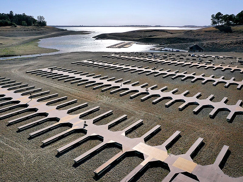 Boat docks at the Browns Ravine Cove sit on dry earth at Folsom Lake on May 10, 2021, in El Dorado Hills, Calif. California Gov. Gavin Newsom declared a drought emergency in 41 of the state's 58 counties, about 30% of the state's population. Folsom Lake i